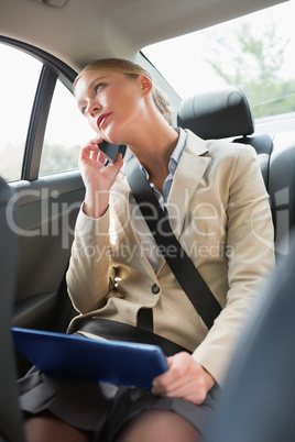 Businesswoman working on her tablet computer