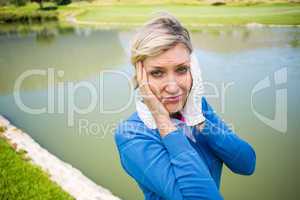 Worried female golfer looking for golf ball