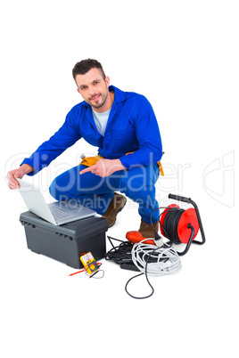 Electrician using laptop