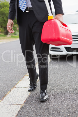 Man bringing petrol canister after broken down