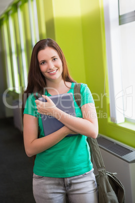 Student using her tablet in library