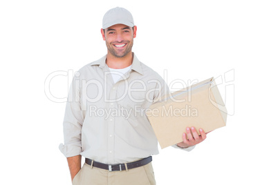 Handsome delivery man with cardboard box on white background