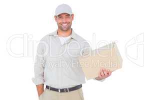 Handsome delivery man with cardboard box on white background