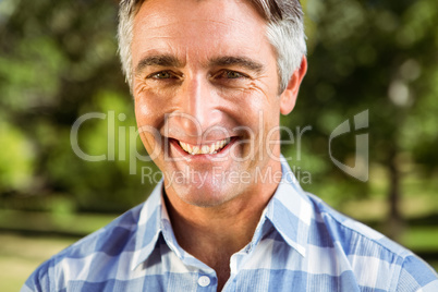 Casual man smiling at camera