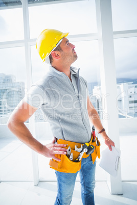 Male supervisor inspecting building
