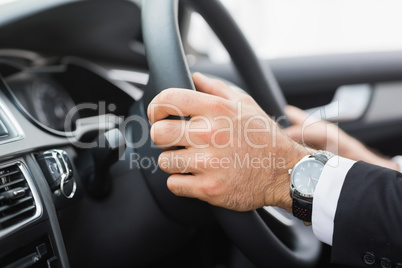 Businessman in the drivers seat