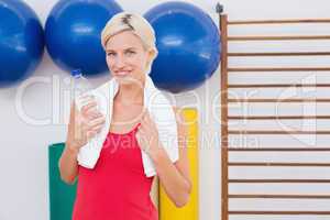 Blonde woman drinking water