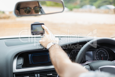 Man using satellite navigation system