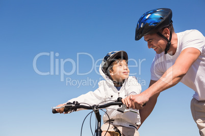 Father and son on a bike ride