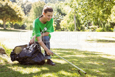 Environmental activist picking up trash