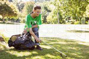 Environmental activist picking up trash