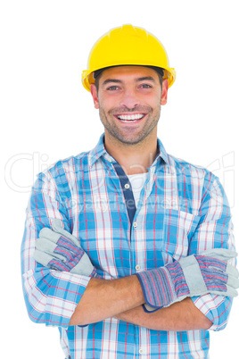 Portrait of smiling manual worker with arms crossed