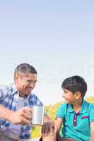 Father and son hiking in the mountains