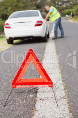 Close up on triangle warning sign