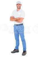 Portrait of confident handyman standing arms crossed