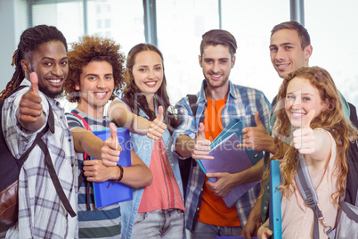 Fashion students smiling at camera together