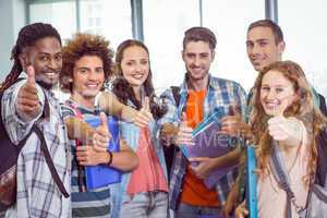 Fashion students smiling at camera together