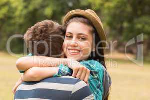 Young couple hugging in the park