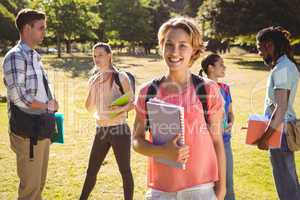 Happy students outside on campus