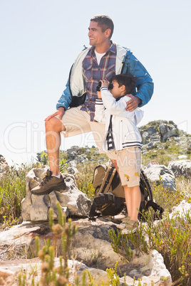 Father and son hiking in the mountains