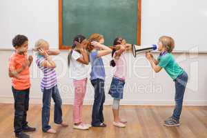 Cute pupil shouting in classroom