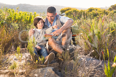 Father and son hiking in the mountains