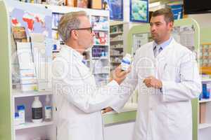Concentrated pharmacist speaking about medication