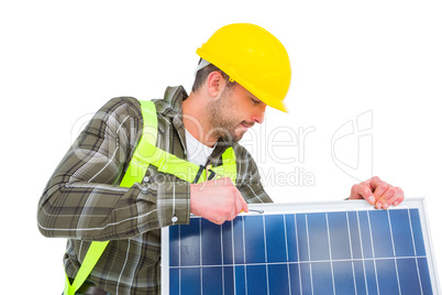 Worker tightening solar panel