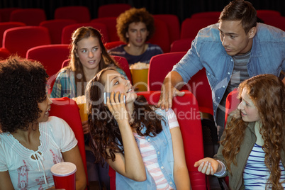 Annoying woman on the phone during movie