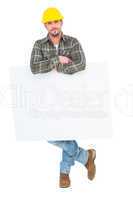 Handyman holding placard