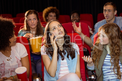 Annoying woman on the phone during movie