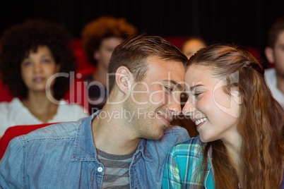 Young couple watching a film