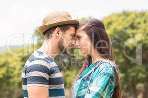 Young couple smiling at each other