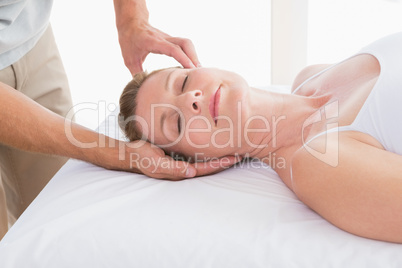 Woman receiving neck massage