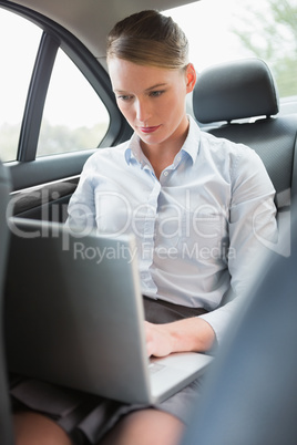 Businesswoman working on her laptop