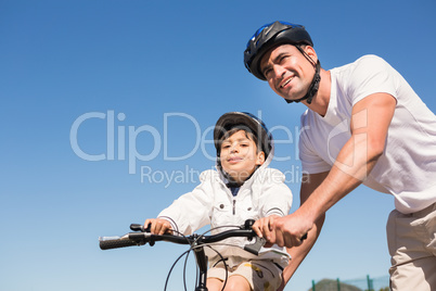 Father and son on a bike ride