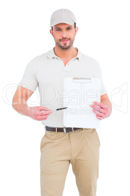 Delivery man giving clipboard for signature