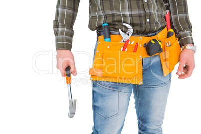 Manual worker holding hammer