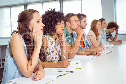 Fashion students being attentive in class