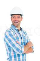 Smiling male worker standing arms crossed