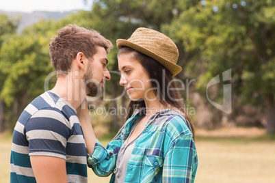 Young couple smiling at each other