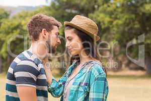 Young couple smiling at each other