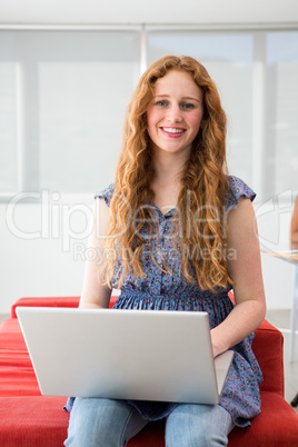 Young woman using laptop