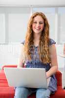 Young woman using laptop