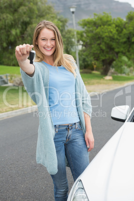 Young woman holding her key