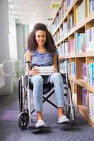 Smiling disabled student in library