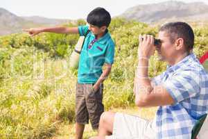 Father and son beside their tent