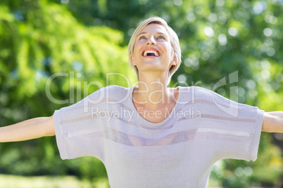 Carefree blonde in a park