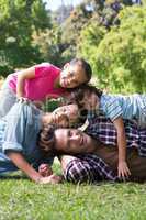 Happy family smiling at camera