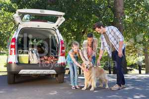 Family getting ready to go on road trip